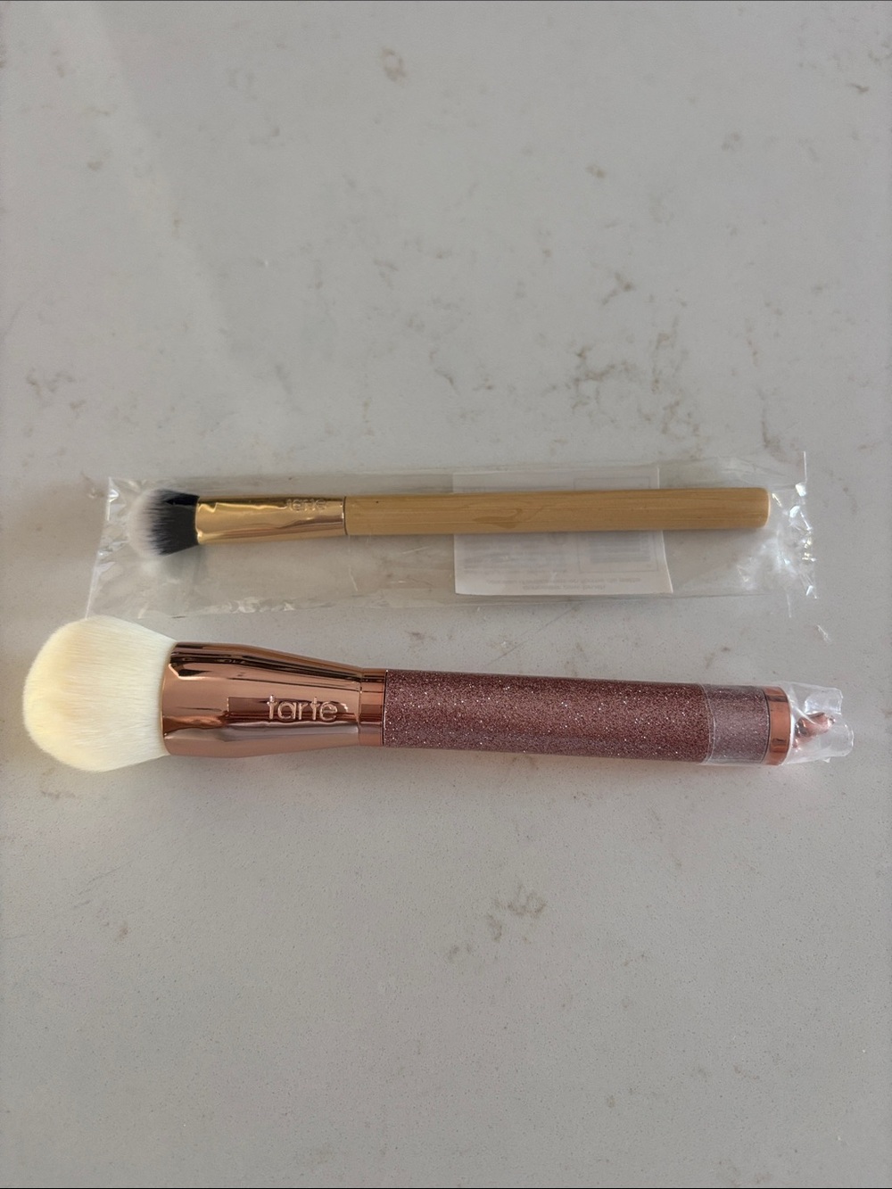 tarte Rose Gold Glitter Face Brush with White Bristles